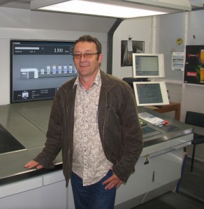 Pat Leitch, managing director of Centurion Print, beside the Komori B1 six-colour plus coater HUV press