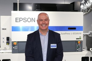 Craig Heckenberg, managing director of Epson Australia with new SurePress label printer