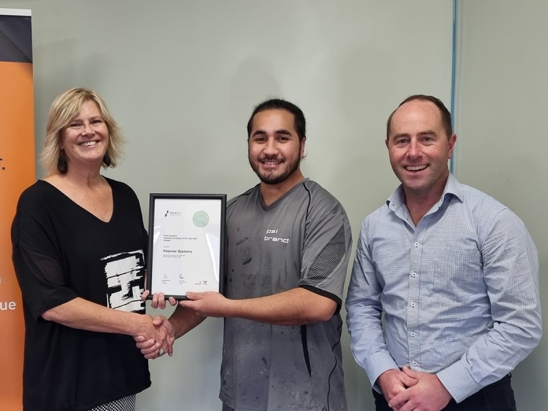 Training Company the Year, from left: PrintNZ membership co-ordinator Linden Hoverd alongside PSI Brand apprentice Niue Vaimoli and general manager Jim Crawshaw